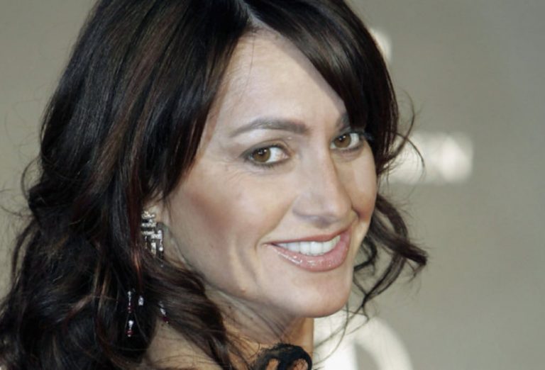 Nadia Comaneci botox body measurements boob job